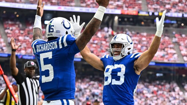 Sep 17, 2023; Houston, Texas, USA; Indianapolis Colts quarterback Anthony Richardson (5) celebrates his touchdown with tight end Kylen Granson (83) against the Houston Texans during the first quarter at NRG Stadium.